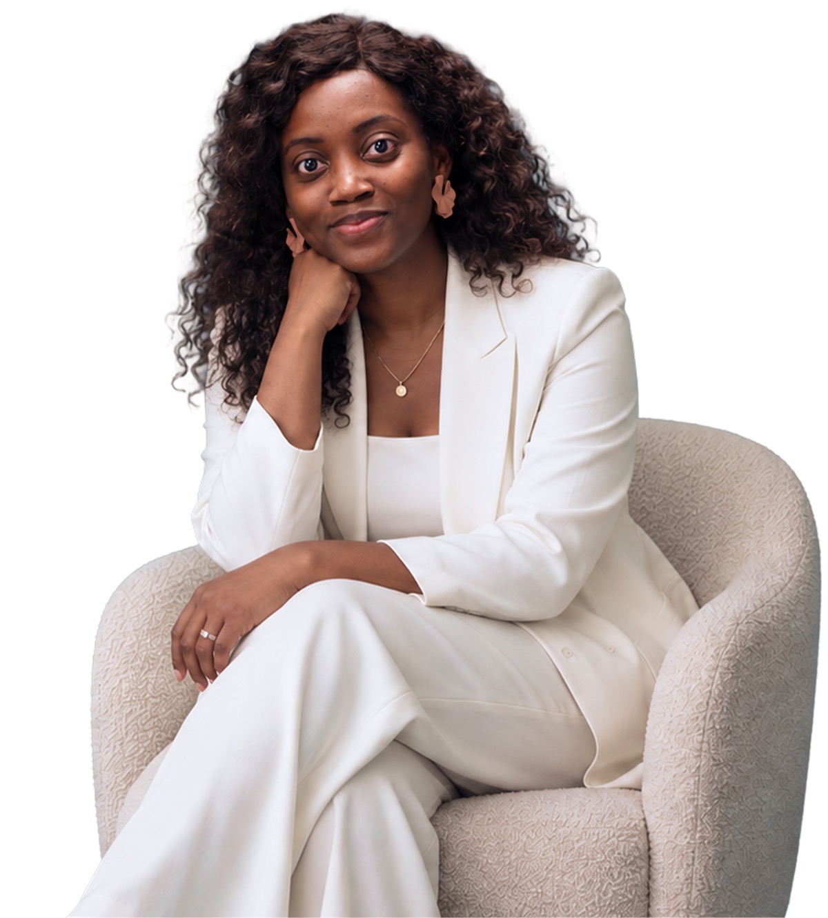 Tolu Folarin, Registered Social Worker, sitting in a chair